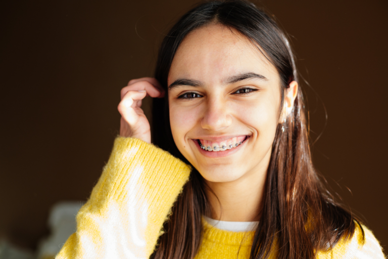 Teen girl with braces smiling